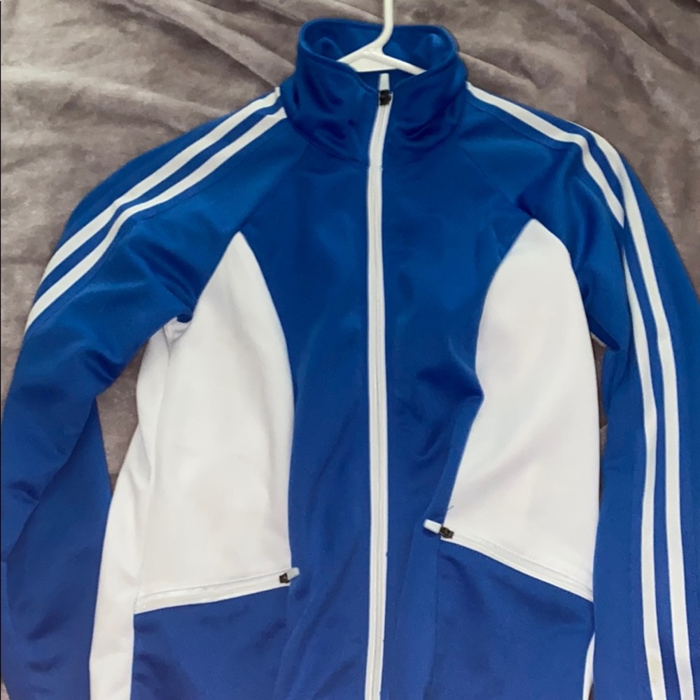 white and blue zip up jacket